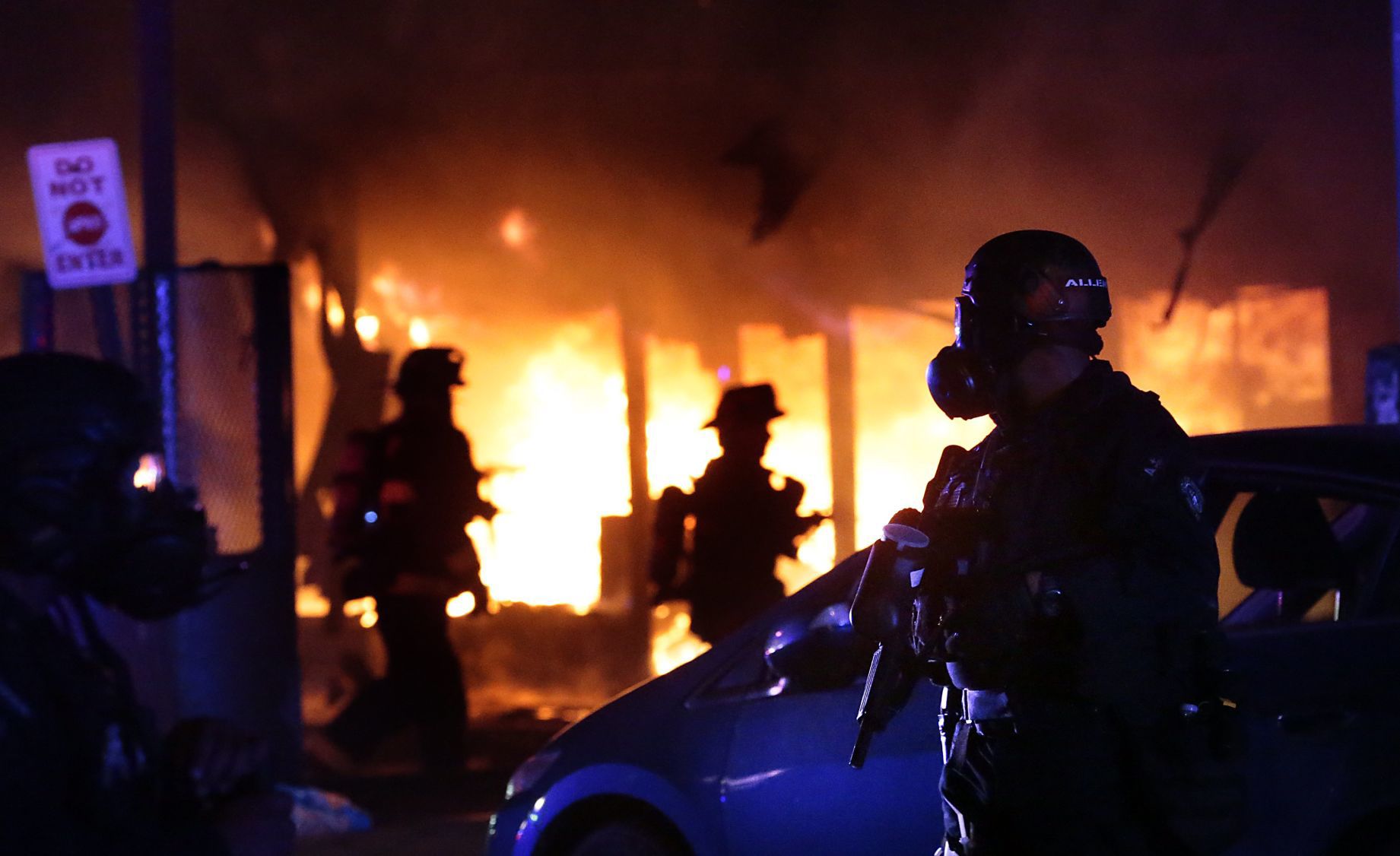 Vandals set fire to downtown 7-Eleven following protest at police station